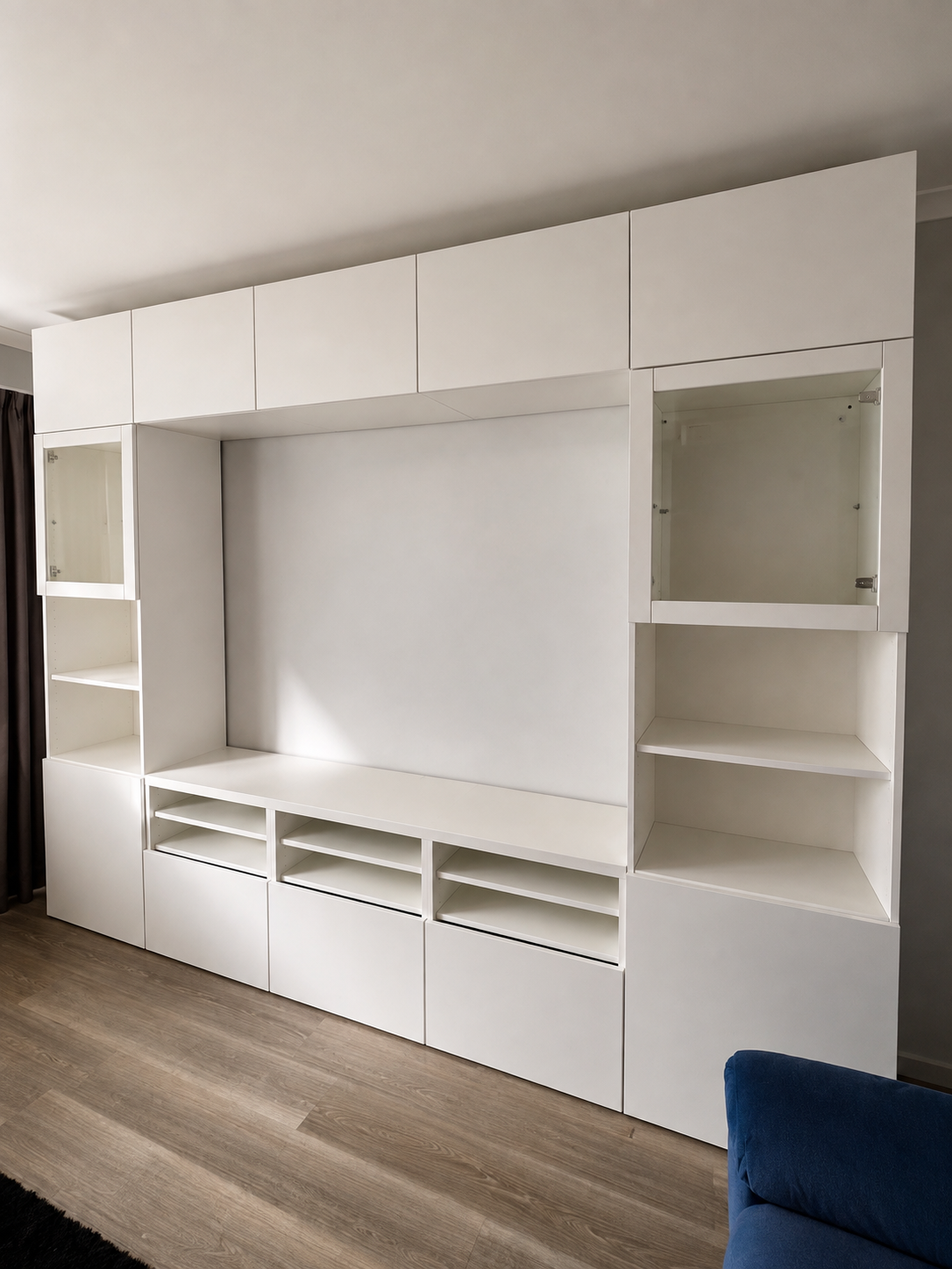 White assembled wall unit and home furniture service